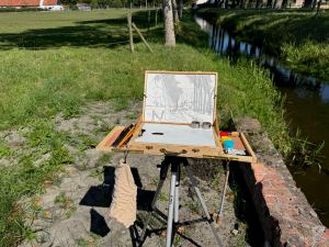 Field set up of pochade box with transposed India inked drawing, ready for oil.